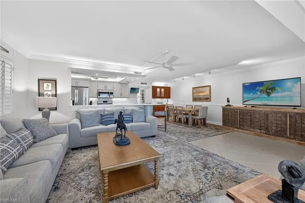 a living room with furniture and a table