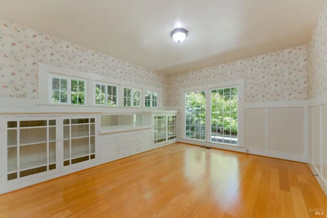 a bathroom with a sink mirror toilet and bathtub