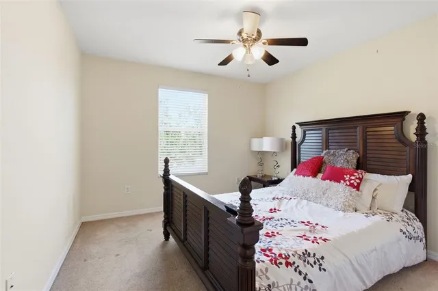 an aerial view of residential houses with outdoor space and river