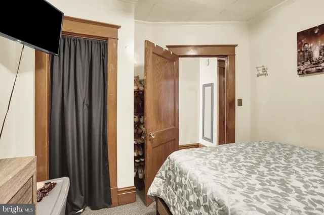 a view of a kitchen with a stove and a window