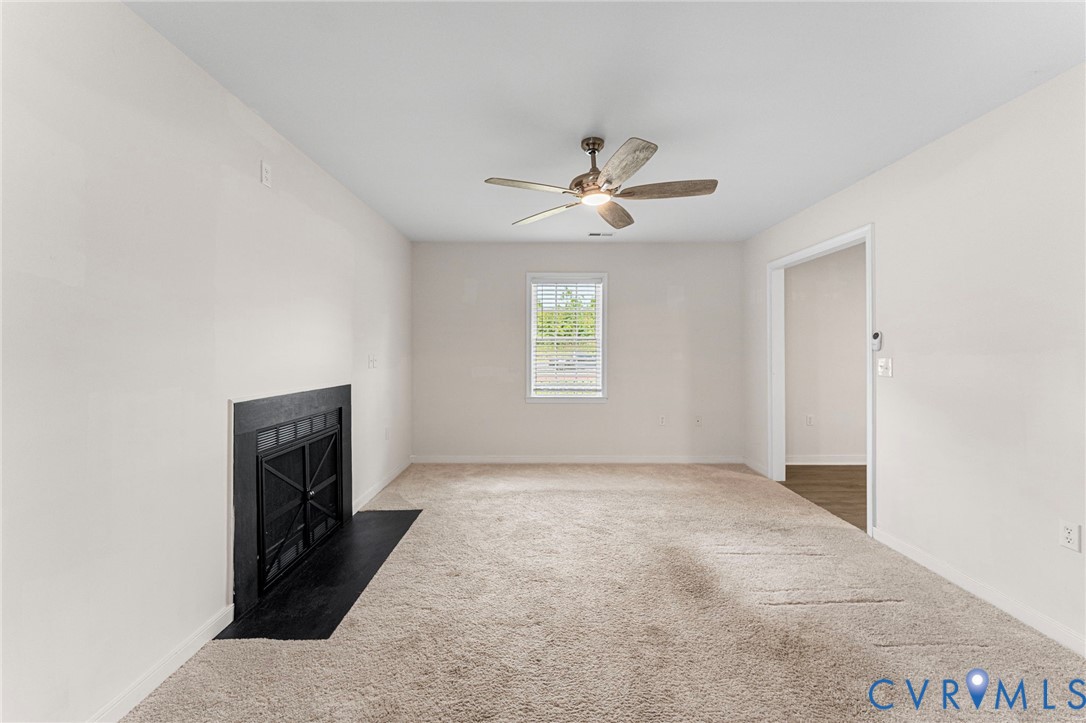 1146 Indian Valley Road Heathsville, VA 22473 - Photo 14 of 45 wooden floor in an empty room with a window