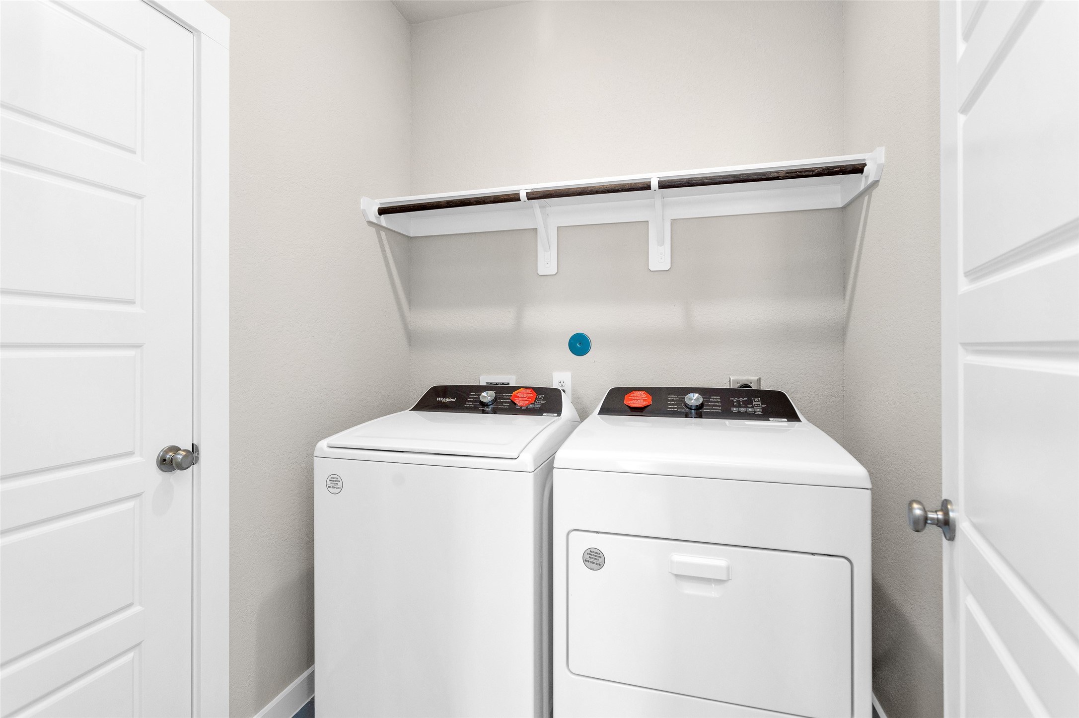 1406 Waggoner Rnch Trail Conroe, TX 77301 - Photo 20 of 43 a utility room with dryer and washer