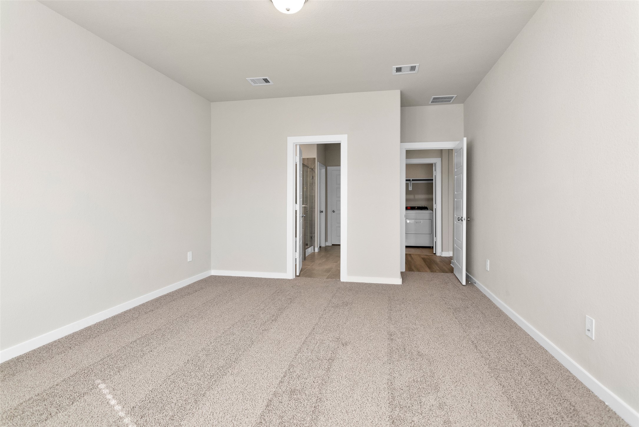 1406 Waggoner Rnch Trail Conroe, TX 77301 - Photo 22 of 43 an empty room with closet and a window