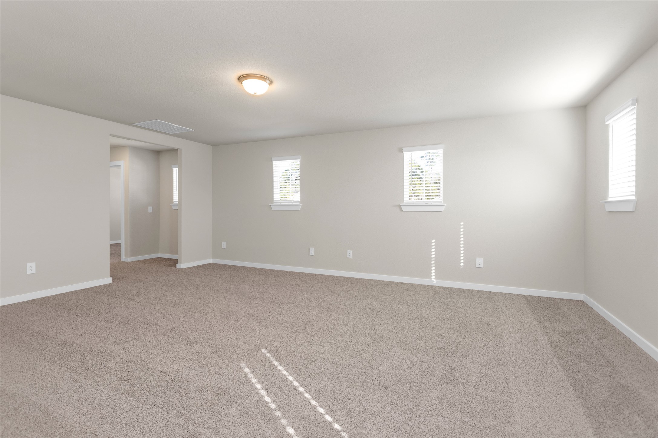 1406 Waggoner Rnch Trail Conroe, TX 77301 - Photo 29 of 43 a view of an empty room with a window
