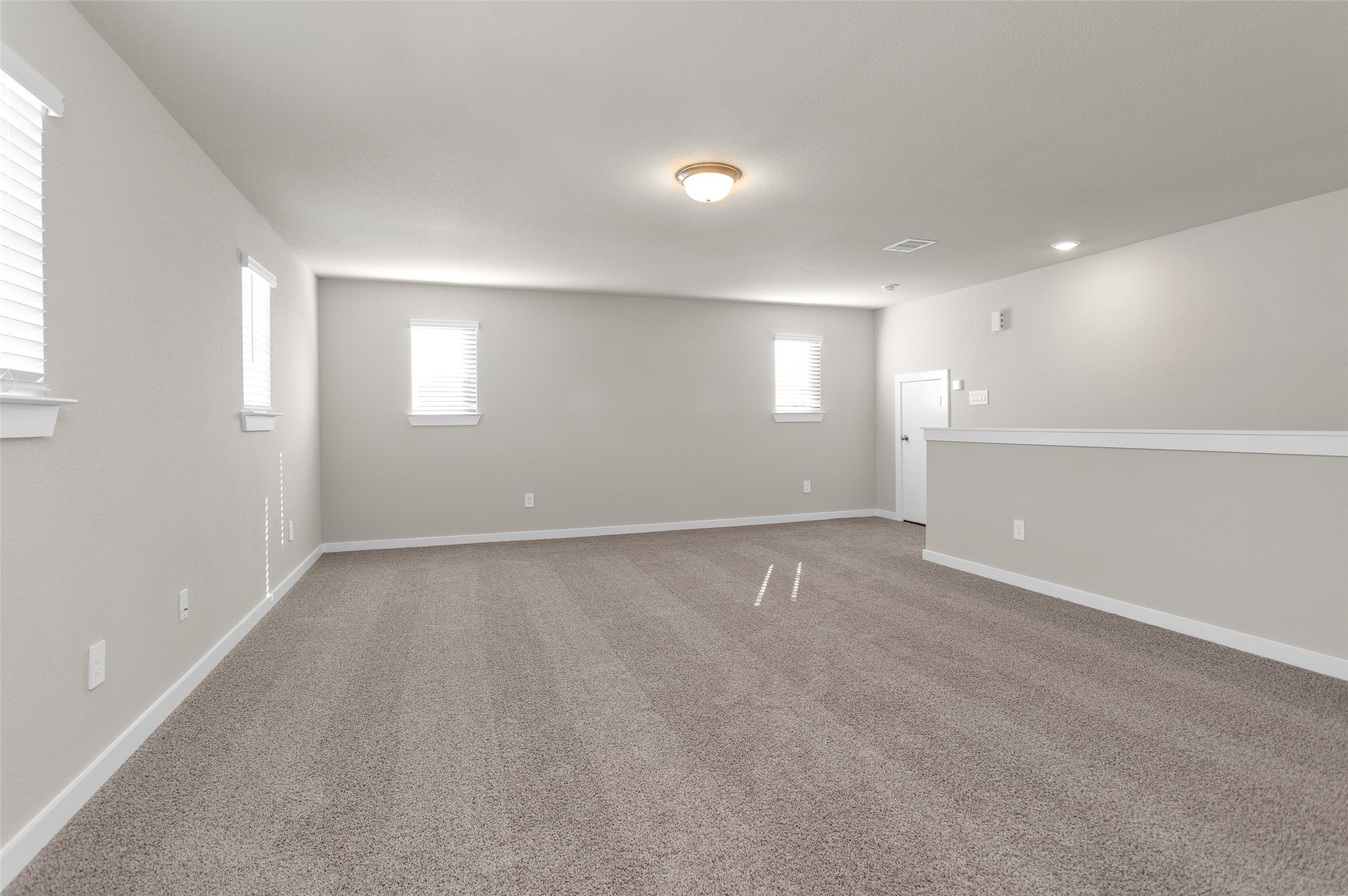 1406 Waggoner Rnch Trail Conroe, TX 77301 - Photo 31 of 43 an empty room with a empty space and windows