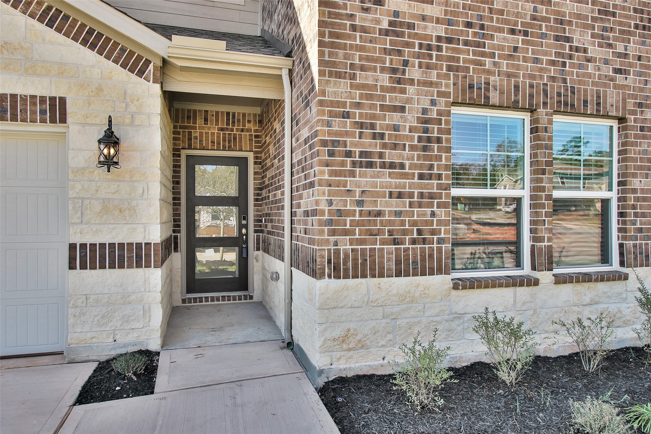 1406 Waggoner Rnch Trail Conroe, TX 77301 - Photo 4 of 43 a view of a balcony with a potted plant