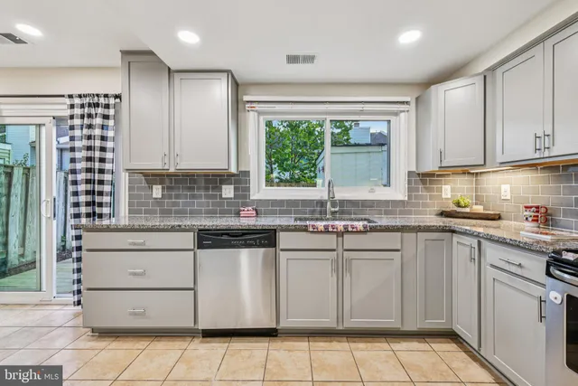 a utility room with closet dryer and washer