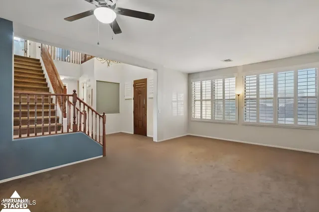 an empty room with windows