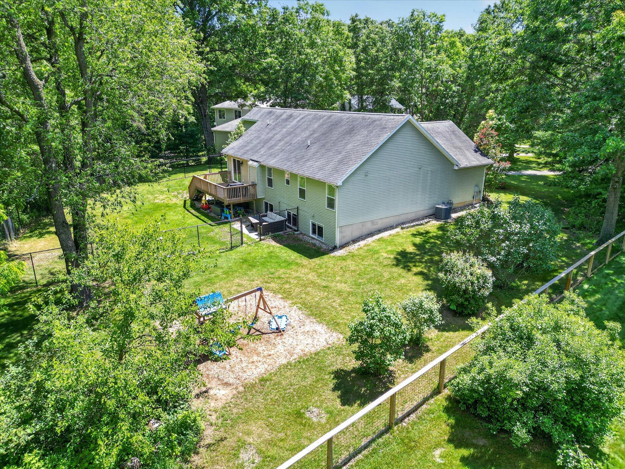 8669 Lilly Ridge Drive Alto, MI 49302 - Photo 51 of 53 57-8669-Lilly-Ridge-Dr-Alto-WindowStill