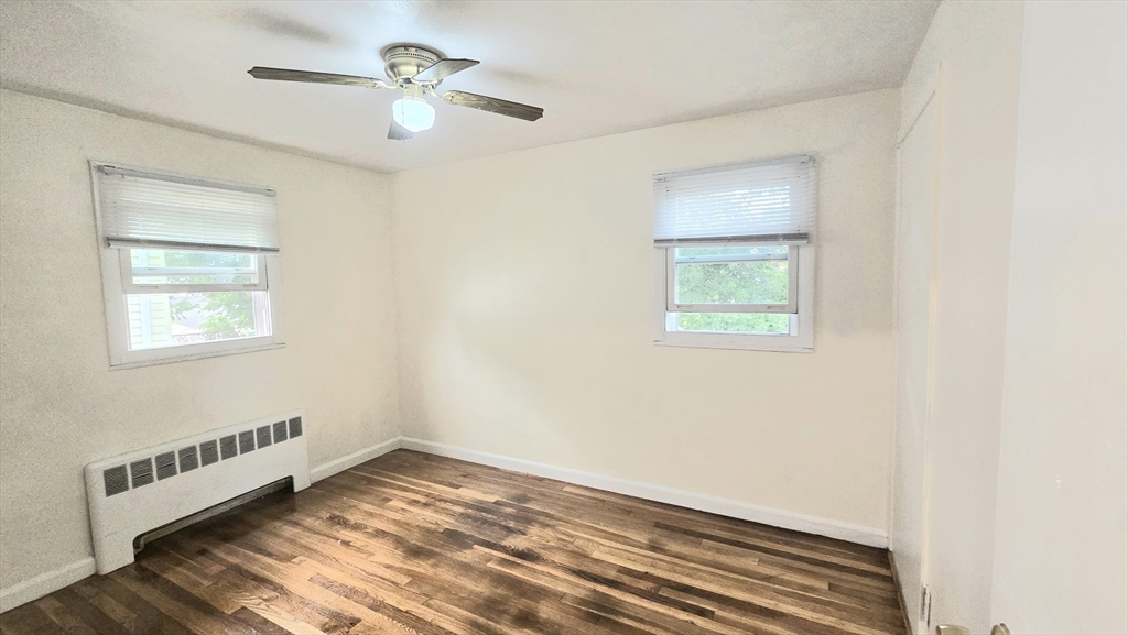 11 Stow Road Boston, MA 02126 - Photo 9 of 25 a view of an empty room with a window