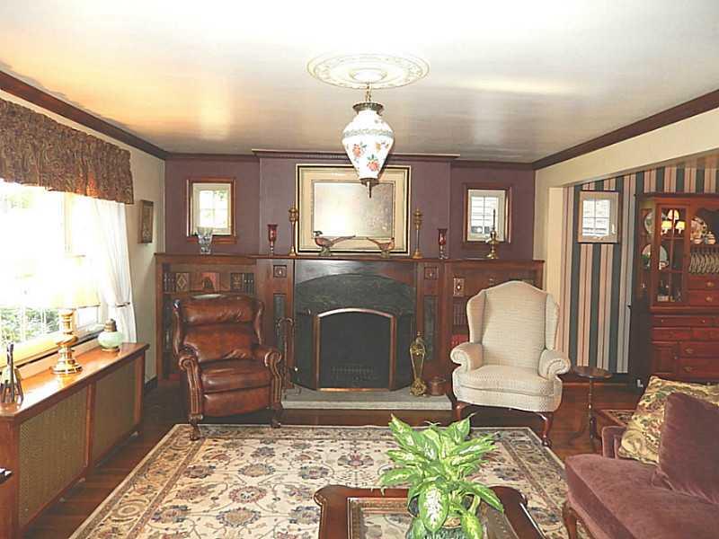 300 Bevington Road Forest Hills, PA 15221 - Photo 2 of 21 Living Room. Large living with hardwood floors an beautiful fireplace.