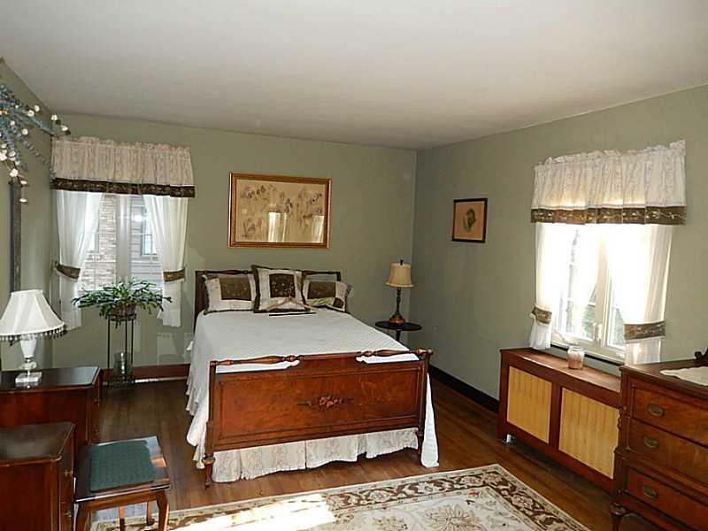 300 Bevington Road Forest Hills, PA 15221 - Photo 17 of 21 Bedroom. Bright, large bedroom with large windows and hardwood floors.