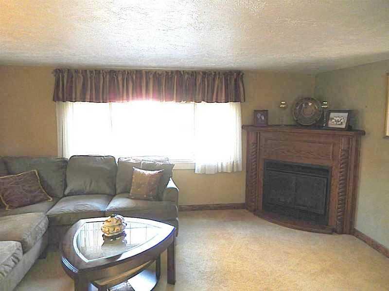 300 Bevington Road Forest Hills, PA 15221 - Photo 9 of 21 Family Room. Family room with corner gas oak fireplace.
