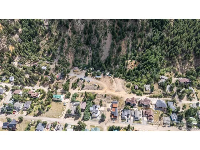 a black and white photo of a house