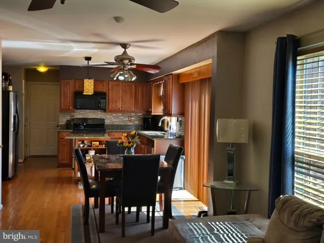 a view of a dining room with furniture