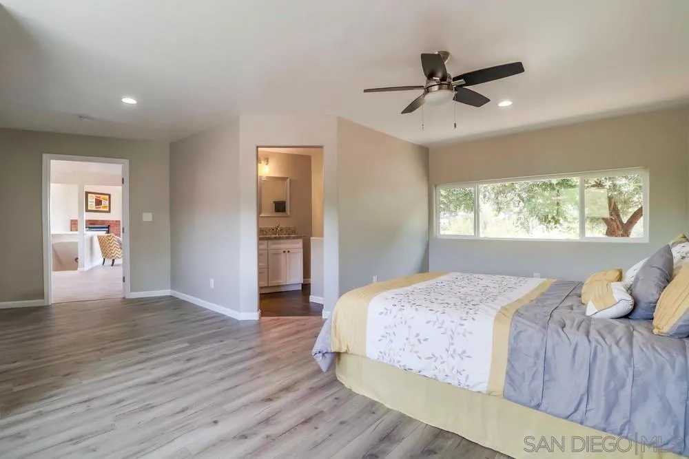 1660 Grove Road El Cajon, CA 92020 - Photo 13 of 44 a bedroom with a bed and a window