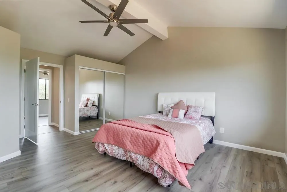 1660 Grove Road El Cajon, CA 92020 - Photo 19 of 44 a bedroom with a bed and closet
