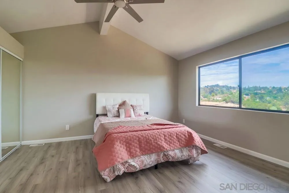 1660 Grove Road El Cajon, CA 92020 - Photo 20 of 44 a bedroom with a bed and window