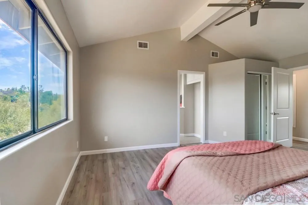 1660 Grove Road El Cajon, CA 92020 - Photo 23 of 44 a bedroom with a bed and a window