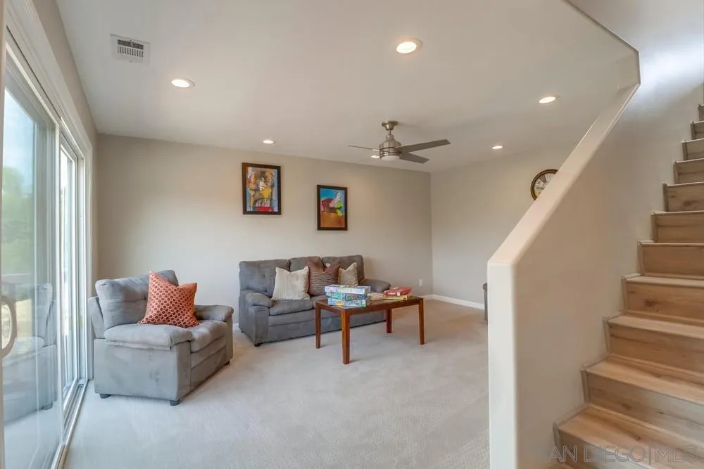 1660 Grove Road El Cajon, CA 92020 - Photo 26 of 44 a living room with furniture and stairs