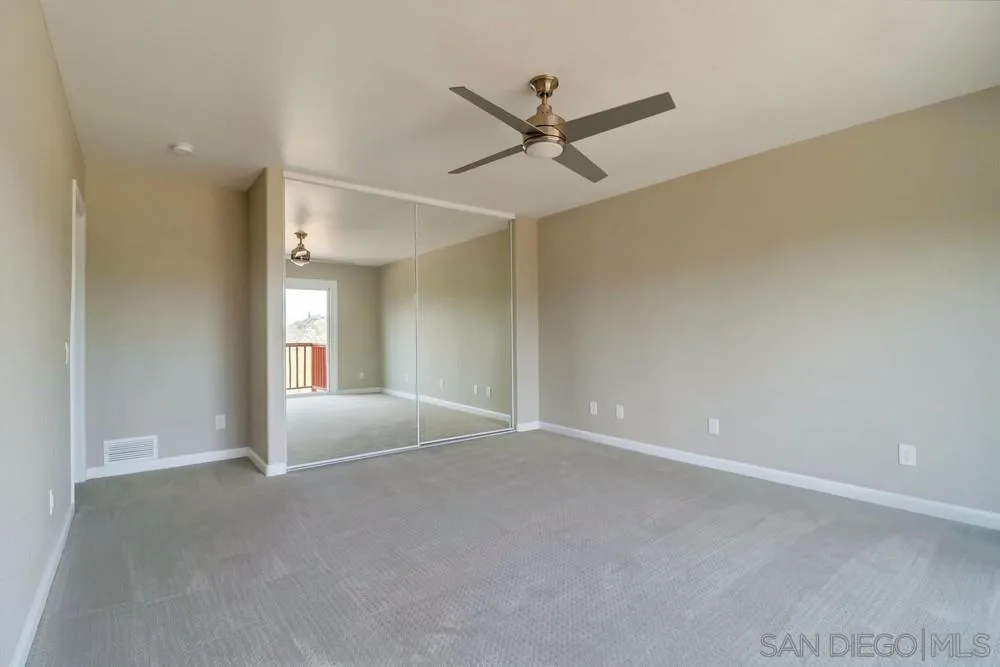 1660 Grove Road El Cajon, CA 92020 - Photo 28 of 44 a view of a livingroom with a ceiling fan and window