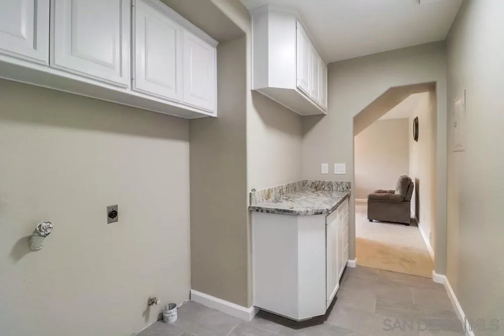 1660 Grove Road El Cajon, CA 92020 - Photo 32 of 44 a storage room with washer and dryer