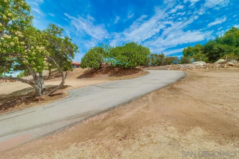 1660 Grove Road El Cajon, CA 92020 - Photo 40 of 44 a view of a street with a trees