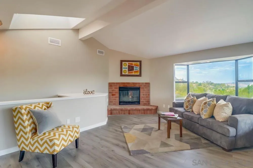 1660 Grove Road El Cajon, CA 92020 - Photo 4 of 44 a living room with furniture and a large window