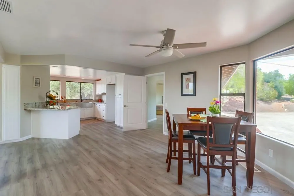 1660 Grove Road El Cajon, CA 92020 - Photo 6 of 44 a view of a dining room with furniture window and wooden floor