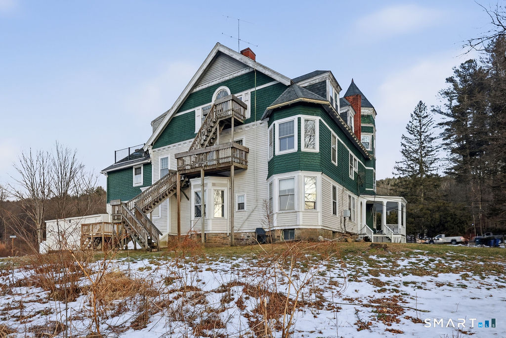 270 Cherry Brook Road, Unit 2 Canton, CT 06019 - Photo 15 of 19 a front view of a house with a yard