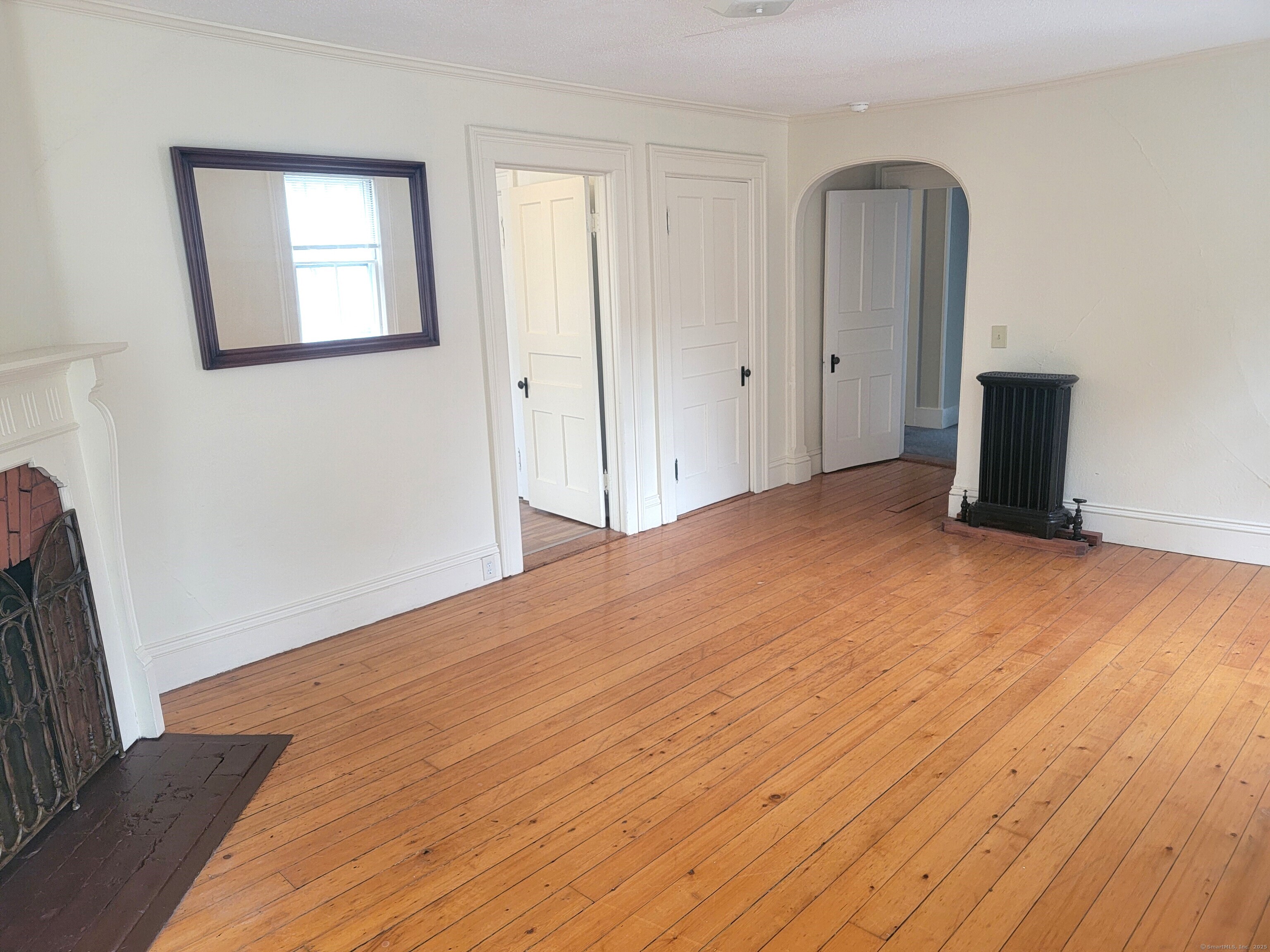 270 Cherry Brook Road, Unit 2 Canton, CT 06019 - Photo 16 of 19 a view of empty room with wooden floor