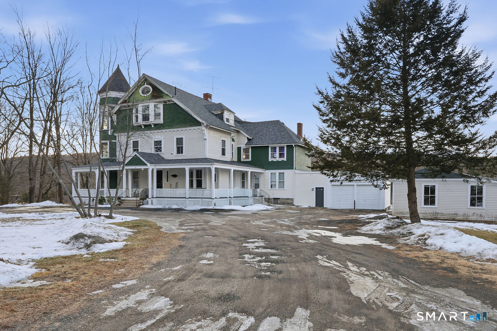 270 Cherry Brook Road, Unit 2 Canton, CT 06019 - Photo 3 of 19 a front view of a house with a yard