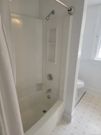 a bathroom with a bathtub