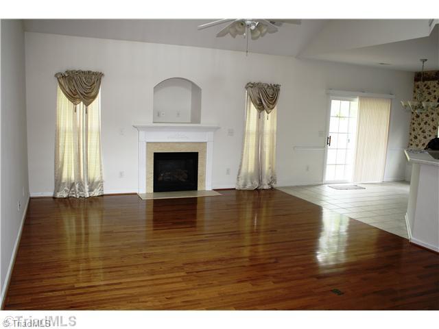 4460 Alexander Road Winston-Salem, NC 27106 - Photo 3 of 16 Living Room. The hardwood floors shine with beauty!