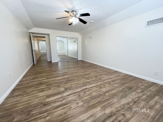 656 West Felspar Avenue Ridgecrest, CA 93555 - Photo 26 of 45 wooden floor in an empty room