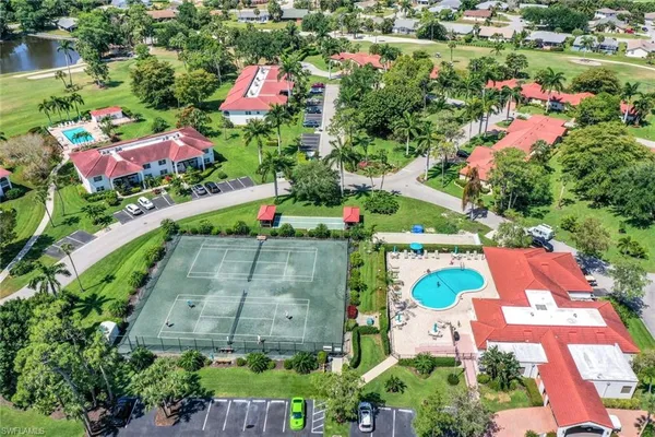 an aerial view of a house with a garden
