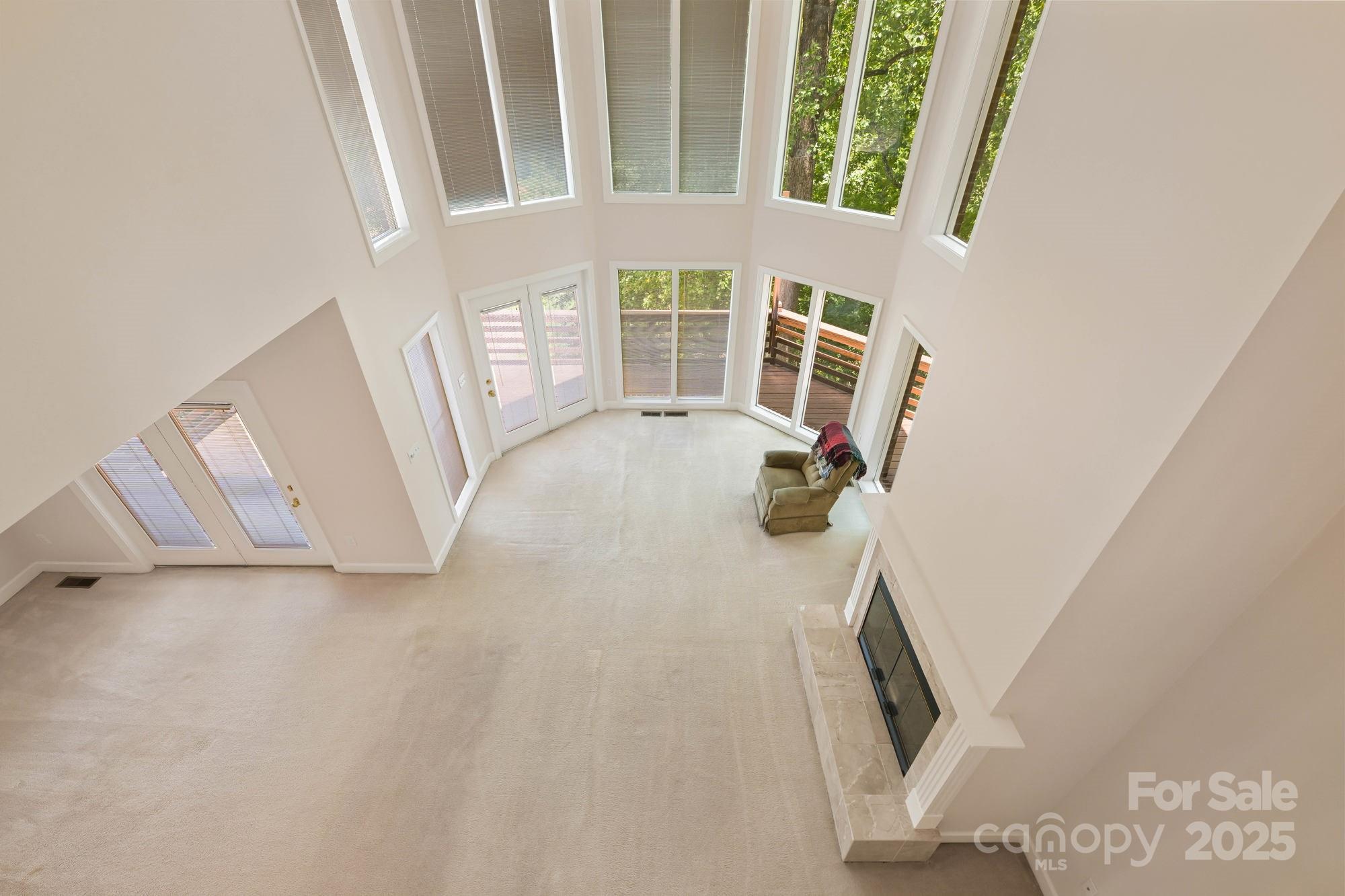 12041 Spinnaker Drive Tega Cay, SC 29708 - Photo 24 of 42 a view of an empty room with a window