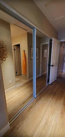 a view of a hallway with front door