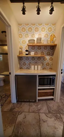 a view of room with washer and dryer