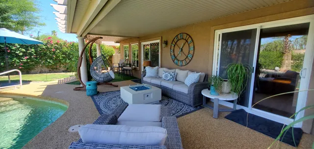 a view of a porch with furniture