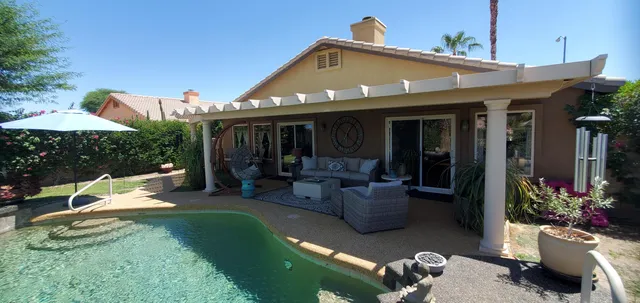 a front view of a house with patio