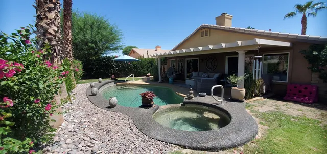 a view of a house with a sink and sitting area