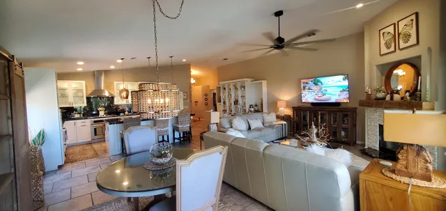 a kitchen with counter top space and stainless steel appliances