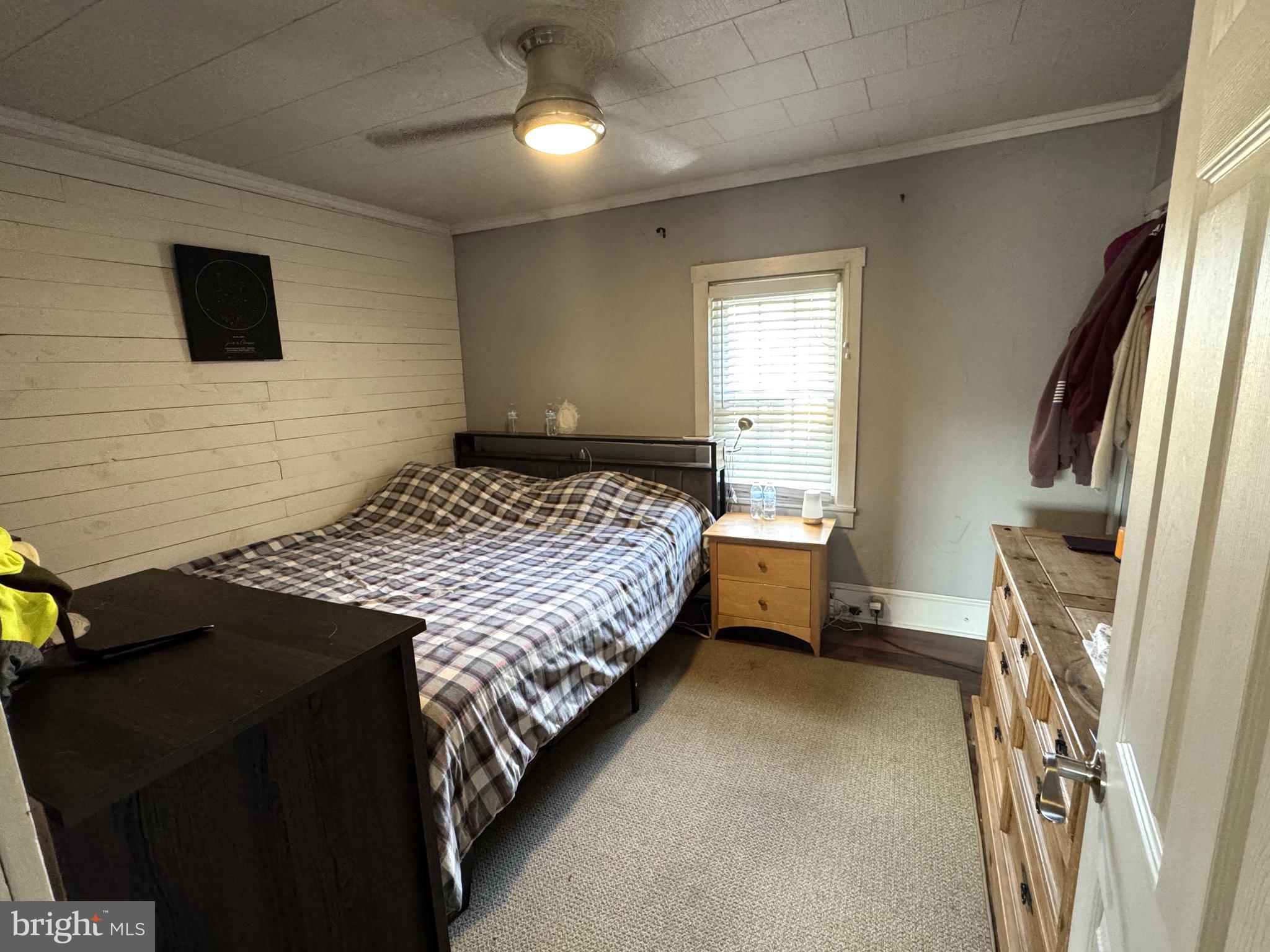 1792 Back Maitland Road Lewistown, PA 17044 - Photo 12 of 31 a bedroom with a bed next to a window with a flat screen tv