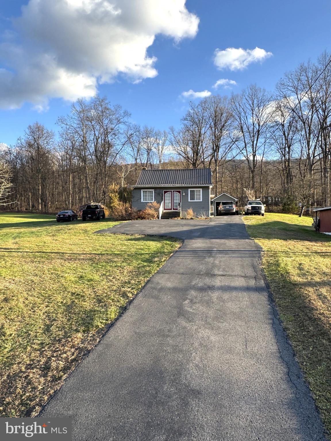 1792 Back Maitland Road Lewistown, PA 17044 - Photo 26 of 31 a view of a swimming pool with an outdoor space and seating area