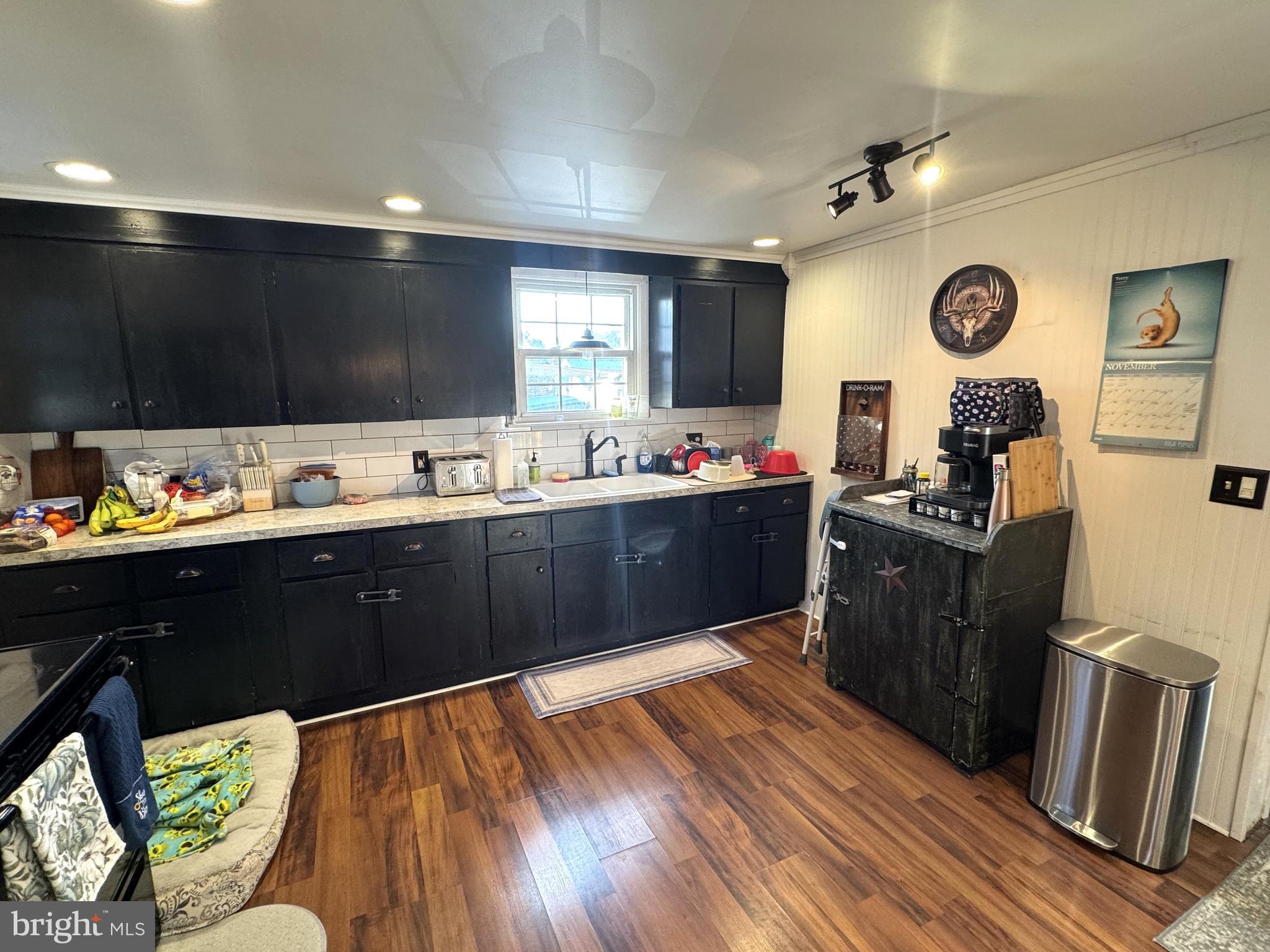 1792 Back Maitland Road Lewistown, PA 17044 - Photo 5 of 31 a kitchen with stainless steel appliances granite countertop a sink dishwasher stove and wooden floor