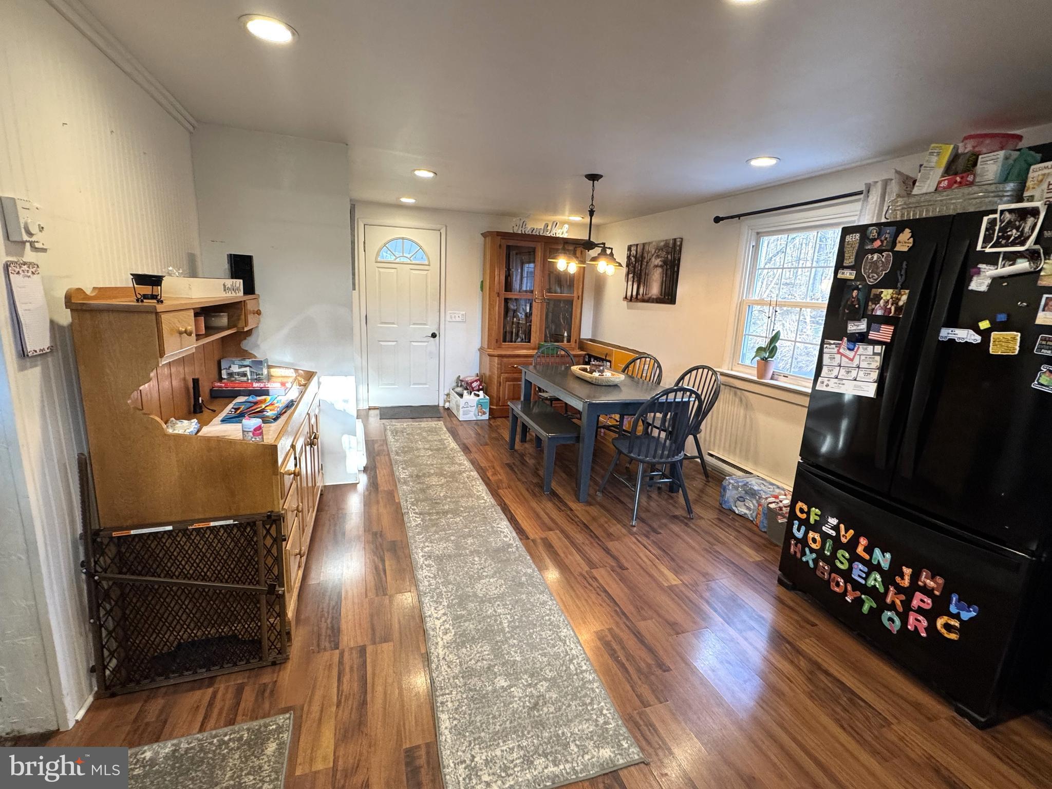 1792 Back Maitland Road Lewistown, PA 17044 - Photo 6 of 31 a dining room with furniture wooden floor and a rug