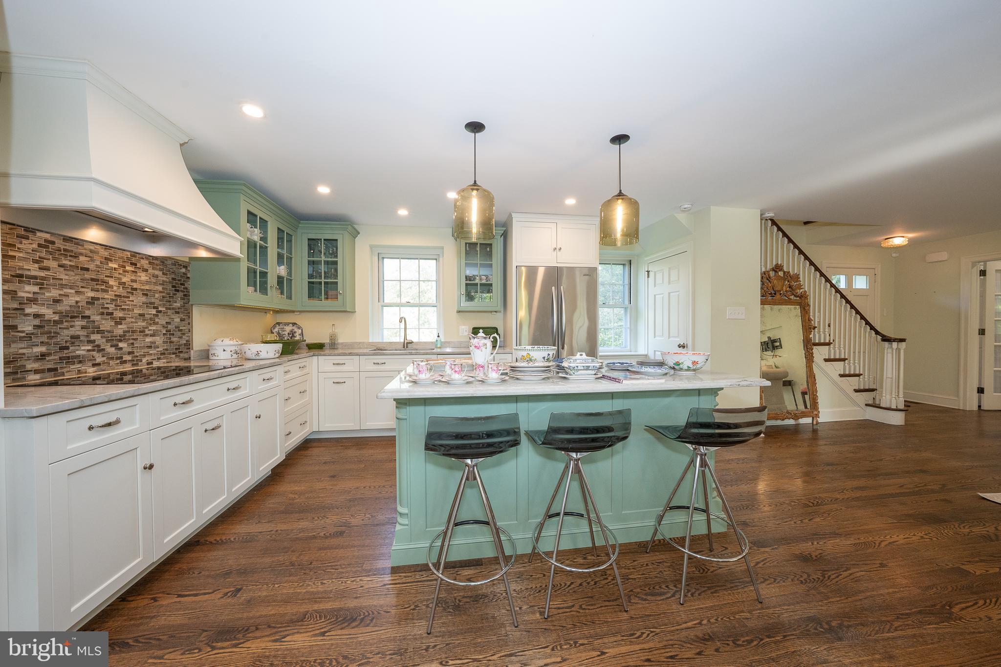 510 Lynmere Road Bryn Mawr, PA 19010 - Photo 15 of 44 a kitchen with a table and chairs in it