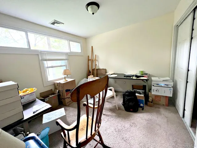 a bathroom with a shower and a toilet