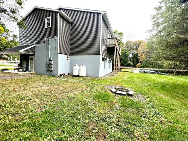 a fire hydrant in the middle of a field